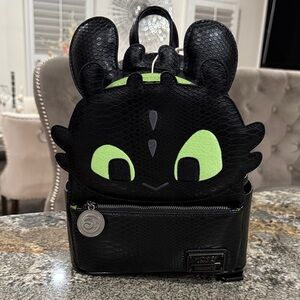 Toothless Cosplay Mini Backpack, with a matching headband. Glows In The Dark